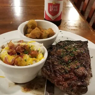 Ice cold Lone Star, loaded mashed potatoes, Ribeye steak and fresh, fried okra.