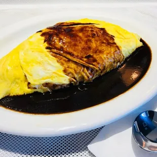 Beef Omu-Rice:Japanese style/ an omelette containing ketchup friced rice