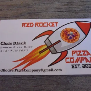 Business card with contact info.
