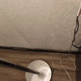 Electrical cord should have been tied up and secured to prevent tripping hazard