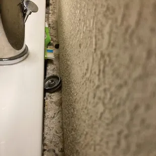 Water seeped from under the sink when brushing my teeth; looked behind the sink and look what I found: AINT mine!!!