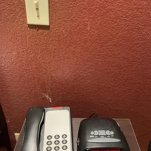 Stains on wall and clock that doesn&apos;t work but was plugged in