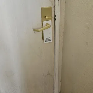 The dirty filthy door and all of the walls were horribly filthy never been cleaned. Definitely needs a new paint job in the whole room.