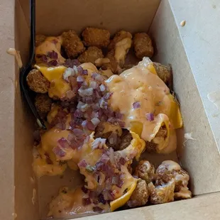 Grilled onions, dressing,tots