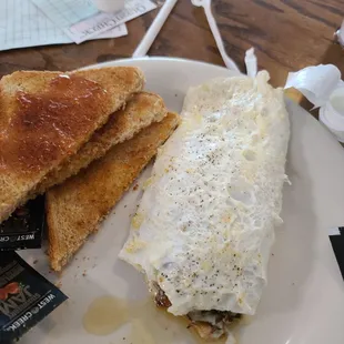 Egg white veggie omelet and wheat toast.