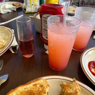 Home made strawberry lemonade and black cherry mimosa... by the way they have a ton of flavored mimosas.