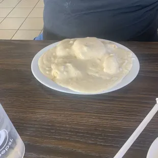 Large biscuits and gravy with extra gravy.