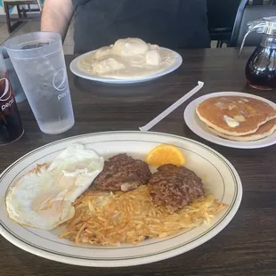 Combination breakfastwith sausage patties and pancakes..