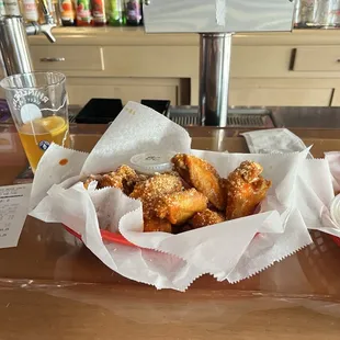 12 wings, blue moon and macaroni bites. $19