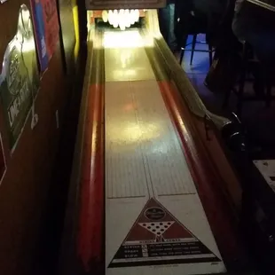 Old-school bowling machine, only costs $0.25 per person to play!
