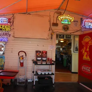 back room with neon signs