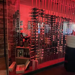 a display of wine bottles in a wine cellar