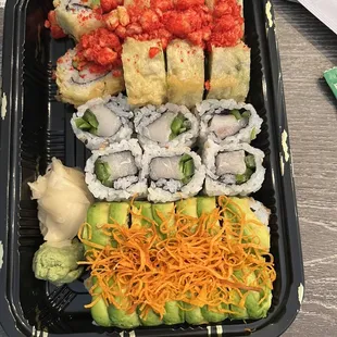 Firecracker roll, yellowtail roll and crunchy roll