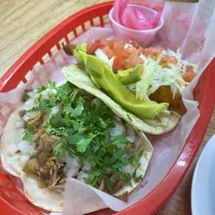 Carnitas and fish taco