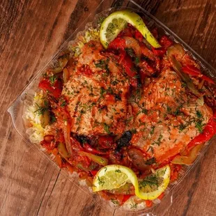 a fish dish on a wooden table