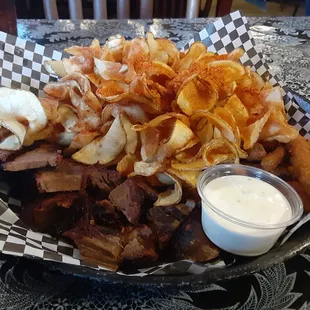 Burnt ends, brisket, fried green beans, house made potato chips