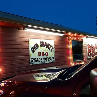 Don&apos;t be fooled when you drive up to The Red Shanty Liquor Store &amp; BBQ shack. Step in &amp; try the tasty BBQ.