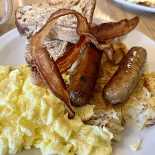 2 Eggs Scrambled, bacon, sausage, hash browns