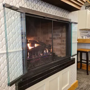 a fireplace with a fire in it