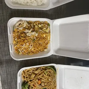 three takeout containers of food