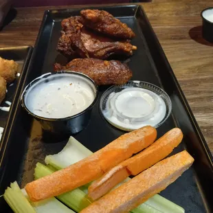 This is their 1/2 order of Wings.Celery wilted. Carrots are hard and old. Wings were dry, cold, tough and chewy