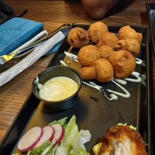 Fried (frozen) mushrooms served cold. Mayo dressing has film on it Indicating its been sitting out A LONG TIME