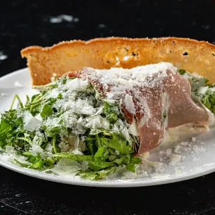 Our Arugula &amp; Prosciutto Salad - Local Baby Arugula, Prosciutto Di Parma, Parmigiano Reggiano &amp; Lemon Pepper Vinaigrette