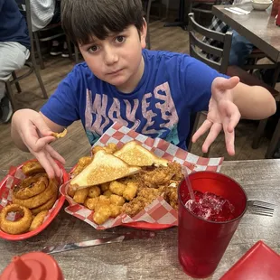 This is the chicken strip meal with tater tot&apos;s and onion rings