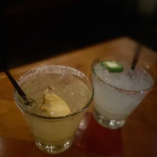 two cocktails on a table