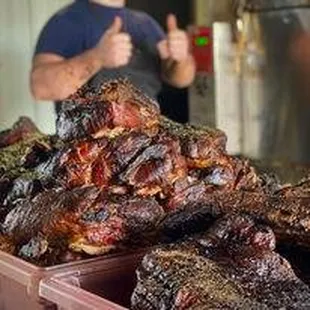 a man giving a thumbs up