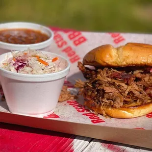 a pulled pork sandwich and coleslaw
