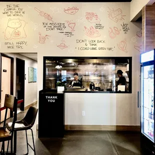 Dining room with window to kitchen