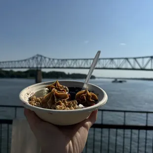 Small açaí bowl with peanut butter, granola, and fruit