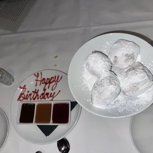 a plate of donuts on a table