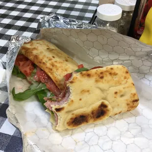 a sandwich wrapped in foil