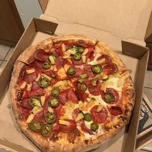 pepperoni, jalapenos, and pineapple