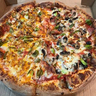 XL pizza - 1/2 supreme and 1/2 cheesy chicken fajita