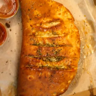 Feta, pepperoni, and onion stromboli. Notice all that grease. Probably why the bottom is a soggy mess, eh?