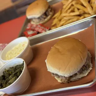 Pork sandwiches, Cole slaw, turnip greens and fries.