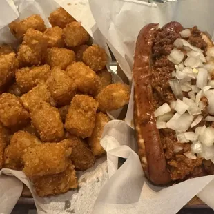 More than enough taters and a chili dog with onions on a pretzel roll out of this world 5