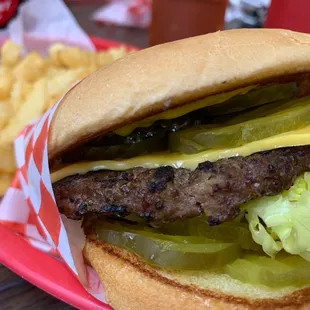 Texas Cheeseburger, sans tomatoes and onions (w/ extra pickles)