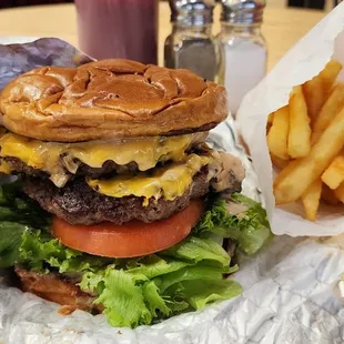 Double fried fries , hand made patties!  Burger build order is spot on. Tomato and onion need to be cut thinner.