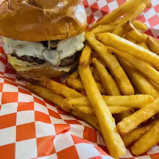 Mushroom burger with provolone. It&apos;s perfect without the onions and tomato.