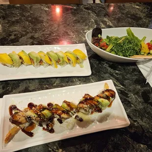 Mango Avocado roll, super dragon  roll,  seaweed salad