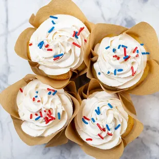 Patriotic Cupcake: Vanilla bean cupcake with vanilla buttercream and patriotic sprinkles.