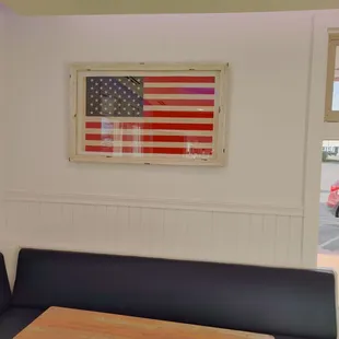 Laid back, patriotic, homey vibe with seats and a nice view to enjoy your treats!