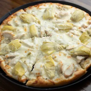 a pizza with artichokes