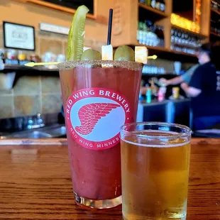 a glass of beer and a drink