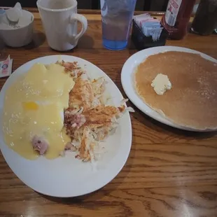 Corned beef hash benedict (drowning in hollandaise) w/hash browns and a pancake