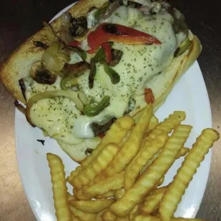 a plate of french fries and a slice of pizza